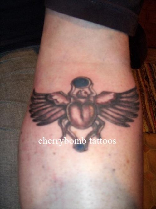 Grey Ink Beetle Tattoo On Left Forearm