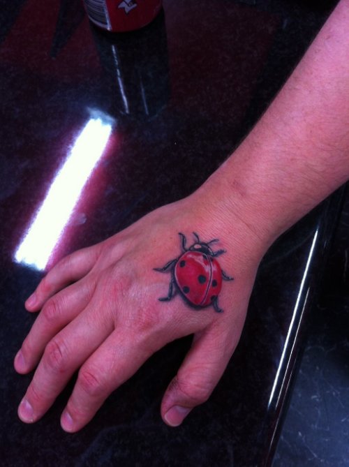 Awesome Beetle Tattoo On Right Hand