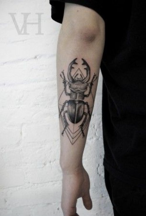 Left Arm Grey Ink Beetle Tattoo