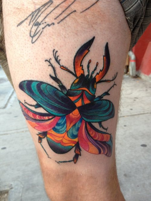 Colored Beetle Tattoo On Thigh