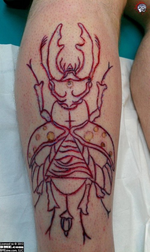Outline Beetle Tattoo On Right Leg