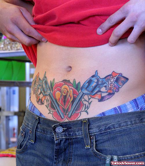 Guns and Roses Belly Tattoo