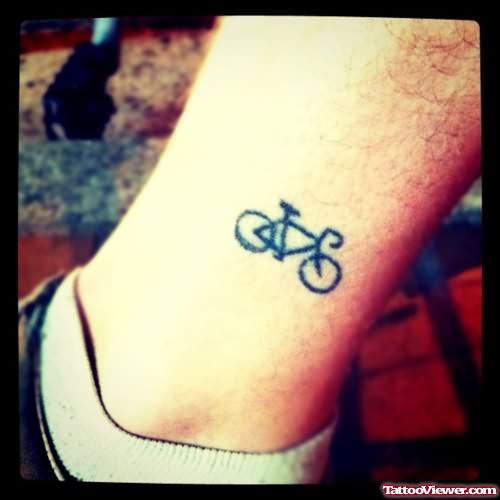 Tiny Bicycle Tattoo On Ankle