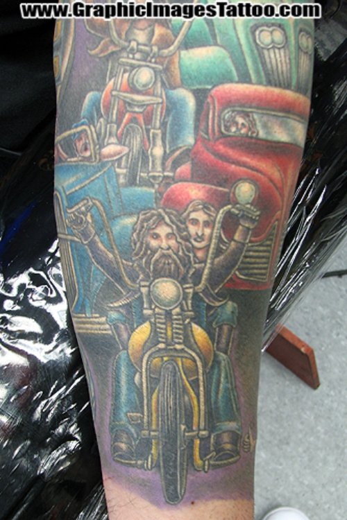 Awesome Colored Biker Tattoo On Sleeve