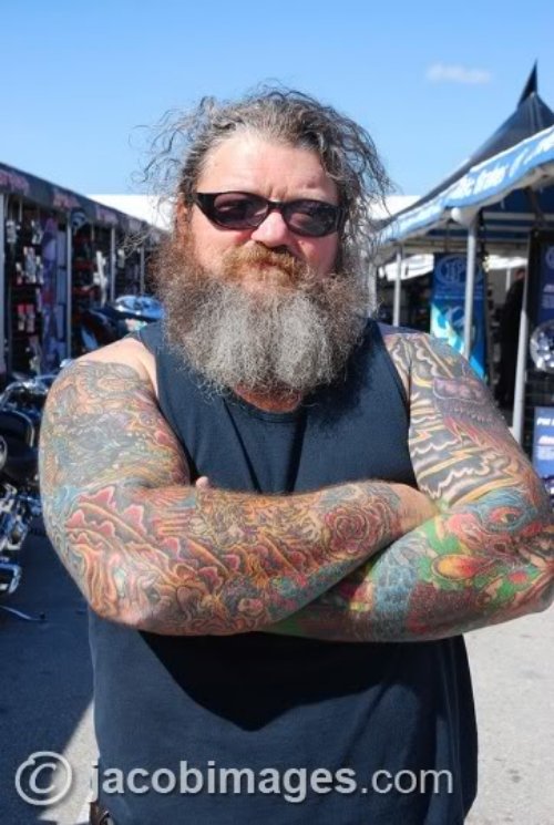 Colored Biker Tattoos On Both Sleeves