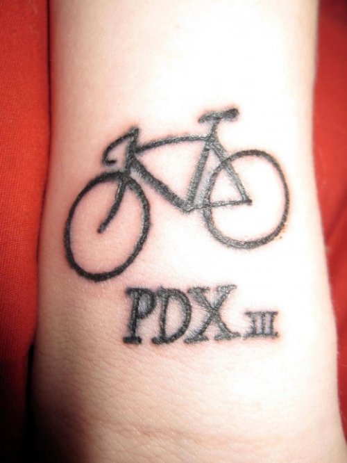 Black Ink Biker Tattoo On Arm
