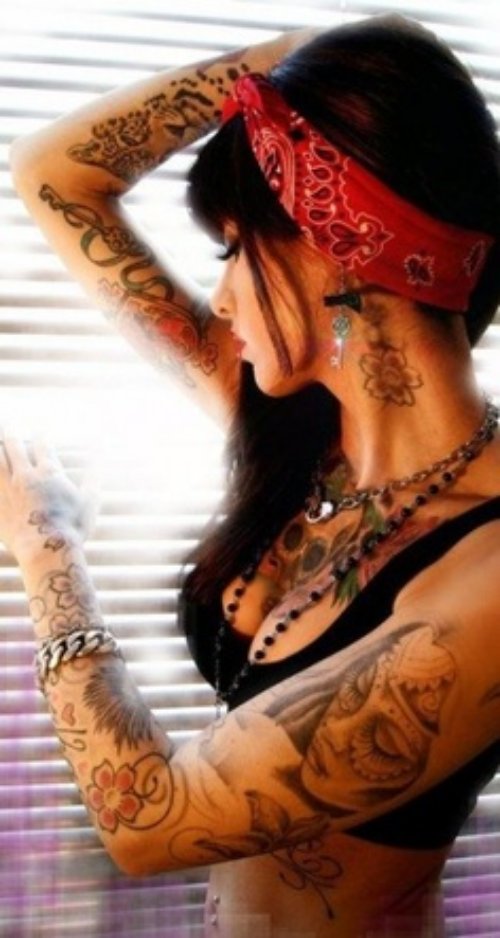 Girl With Biker Tattoo On Bicep