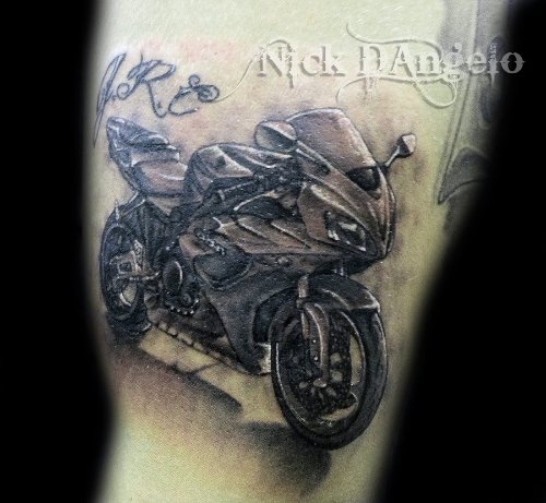 Nice Grey Ink Biker Tattoo On Sleeve