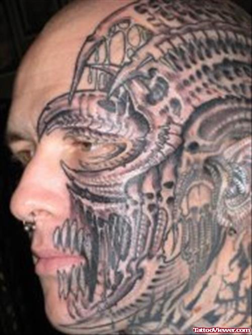 Man Face Biomechanical Tattoo