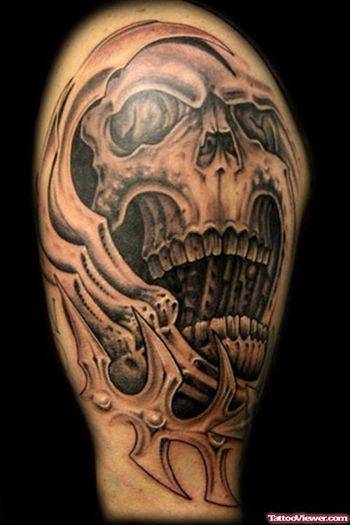 Grey Ink Biomechanical Skull Tattoo On SHoulder