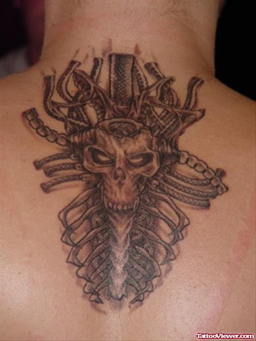 Grey Ink Biomechanical Tattoo On Upperback