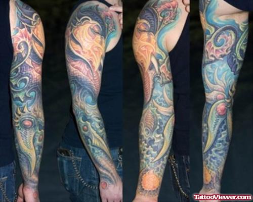 Colored Biomechanical Tattoo On Man Right Sleeve