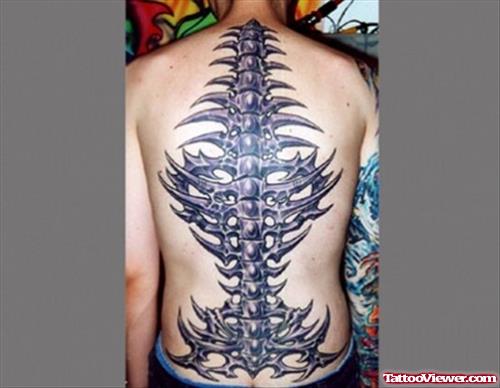 Attractive Grey Ink Biomechanical Tattoo On Back Body