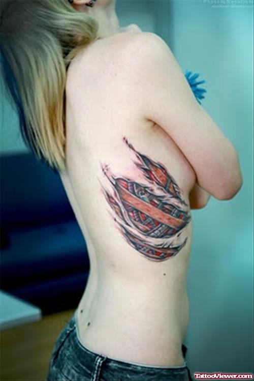 Biomechanical Torn Flesh Ribcage Tattoo
