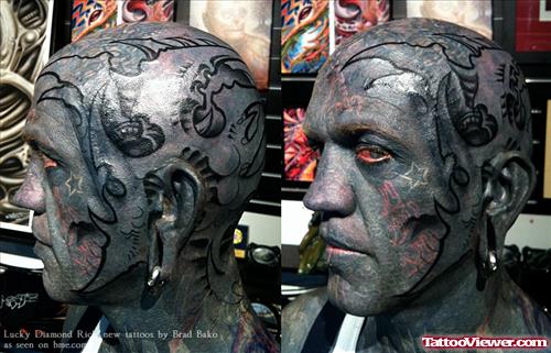 Biomechanical Tattoo On Man Head And Face