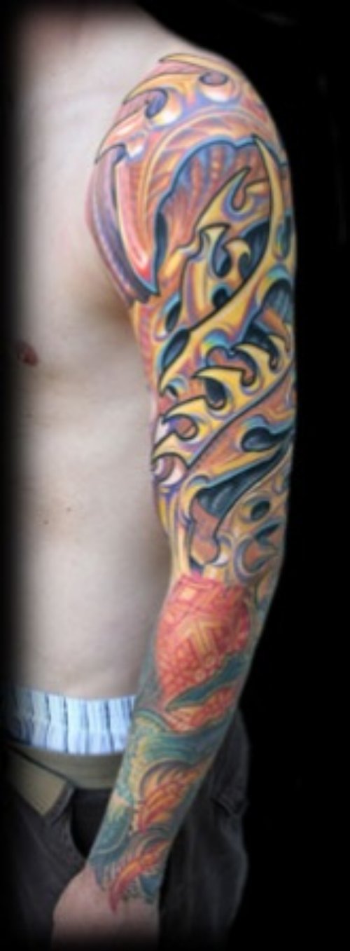 Colored Ink Biomechanical Tattoo On Man Left Sleeve