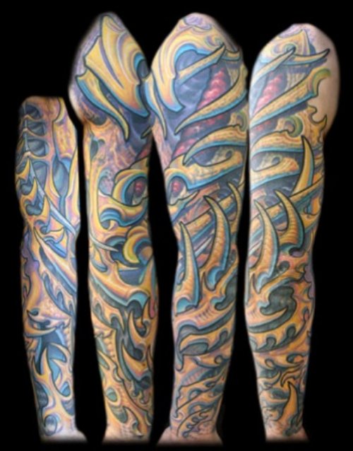 Colored Tribal Biomechanical Tattoo On Sleeve