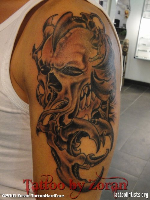 Grey Ink Shoulder Biomechanical Tattoo