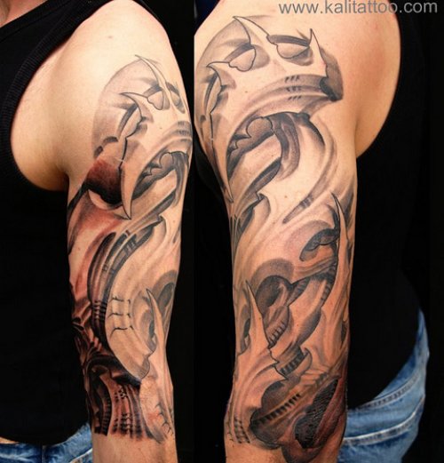 Grey Ink Tribal Biomechanical Tattoo On Left Half Sleeve