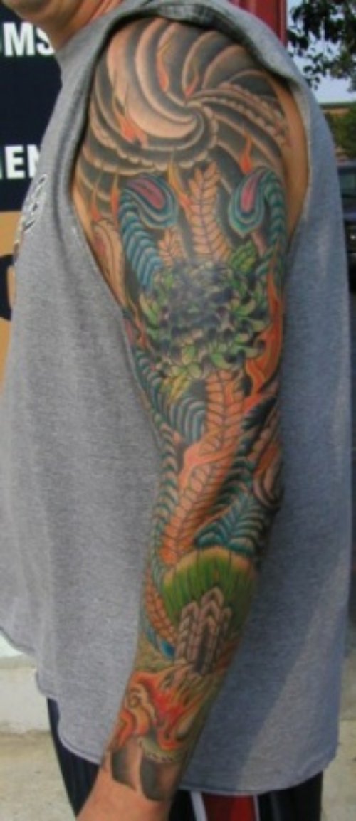 Left sleeve Colored Biomechanical Tattoo