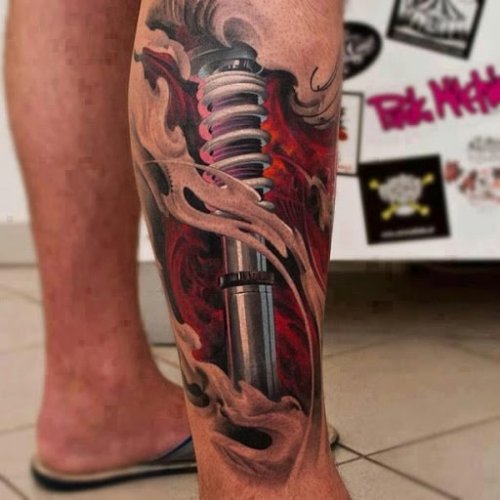 Biomechanical Tattoo On Man Right Leg