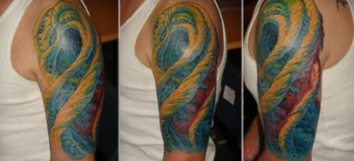 Best Colored Ink Biomechanical Tattoo On Man Left Half Sleeve