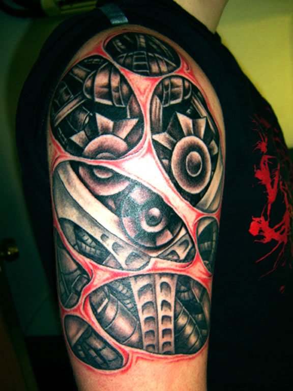 Awesome Biomechanical Tattoo On Man Half Sleeve