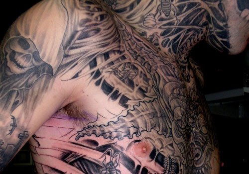Biomechanical Tattoo On Man Chest