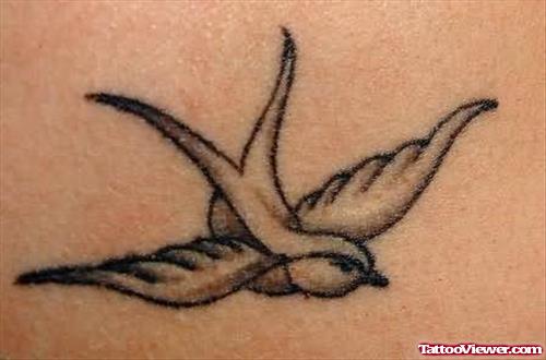 Awesome Flying Bird Tattoo