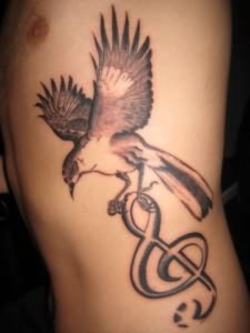 Bird Voice Tattoo On Rib