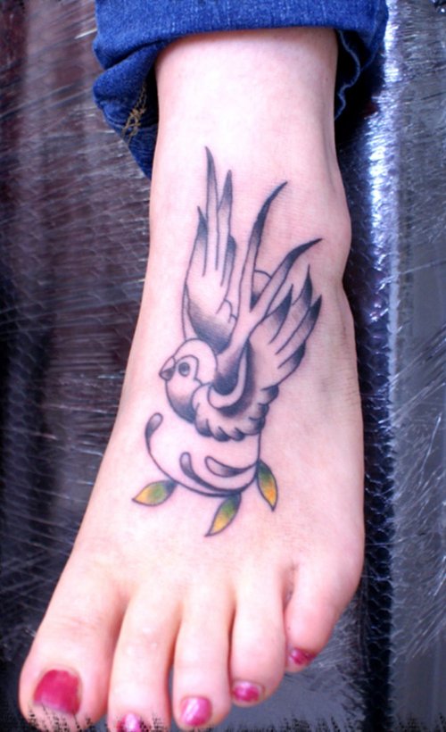 Grey Ink Bird Tattoo On Left Foot
