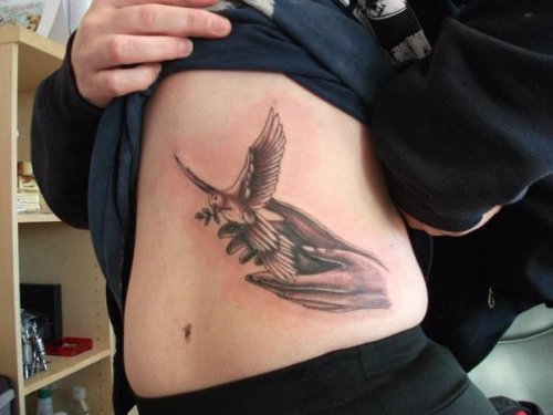Dove Flying From Hands Bird Tattoo