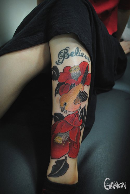 Red Flowers And Bird Tattoo On Left Leg