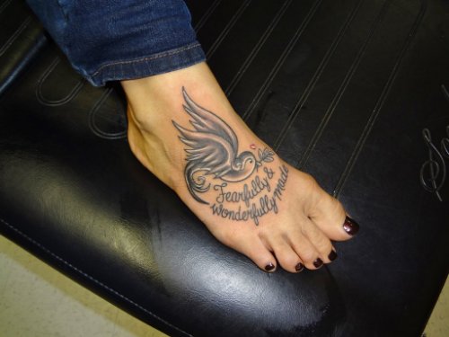 Amazing Grey Ink Swallow Bird Tattoo