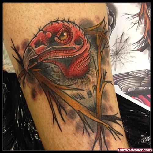 bird in nest tattoo