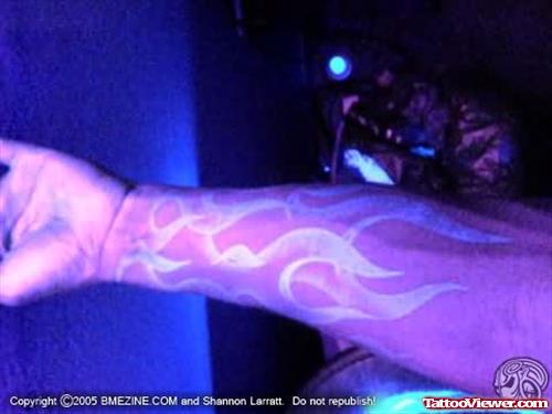 Flame Black Light Tattoo On Arm