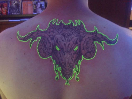 Upperback Tribal Goat Head Black Light Tattoo
