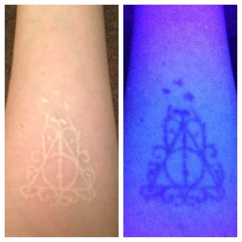 Triangle Black Light Tattoo On Arm