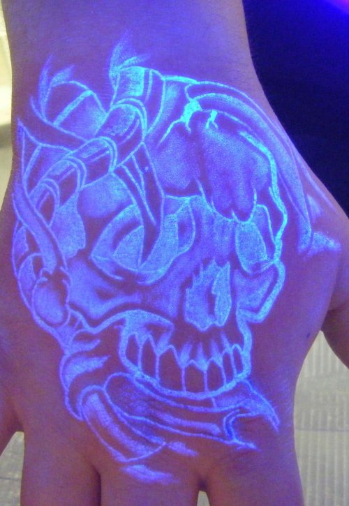 Black Light Skull Tattoo On Right Hand