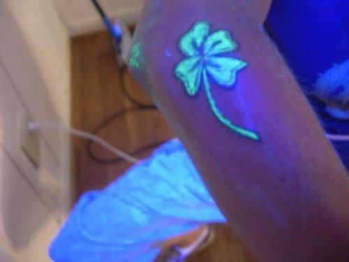 Black Light Flower Tattoo On Arm Sleeve