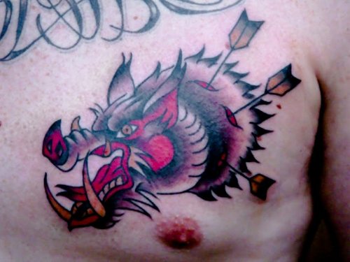 Traditional Arrows In Boar tattoo On Chest