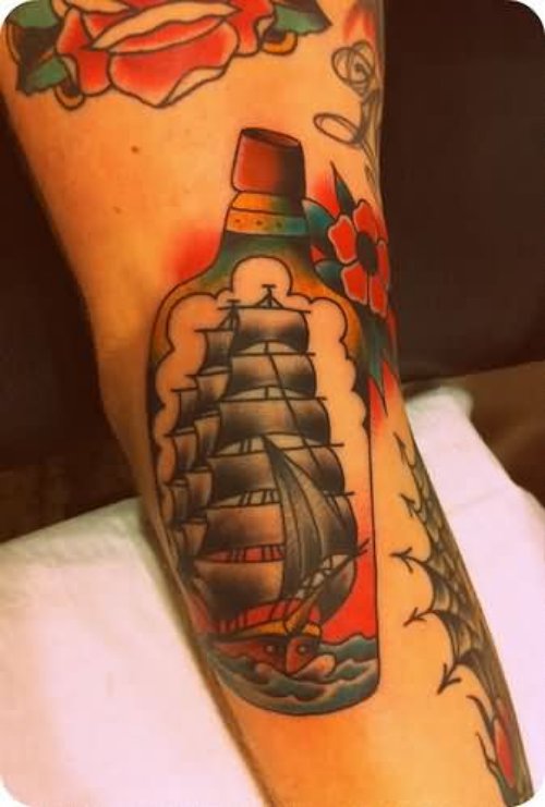 Ship In Bottle Tattoo On Right Sleeve