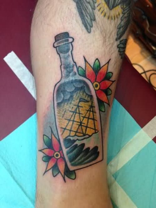 Flowers And Bottle Tattoo On Leg