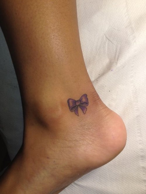 Small Purple Bow Tattoo On Ankle