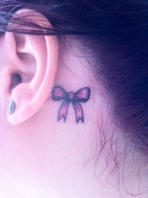 Pink Bow Tattoo Behind The Left Ear