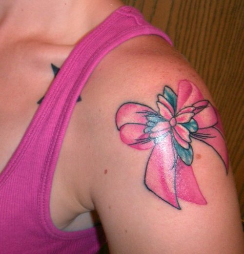 Pink Bow Tattoo On Left Shoulder