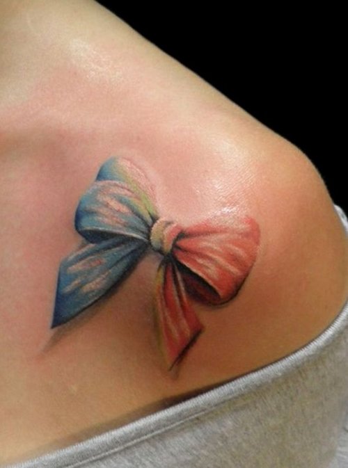 Multicolored 3d Bow Tattoo On Front Shoulder