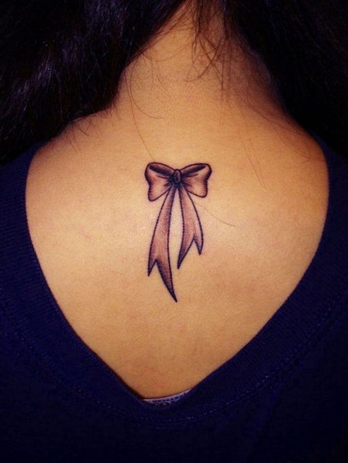 Bow Tattoo On Girl Back