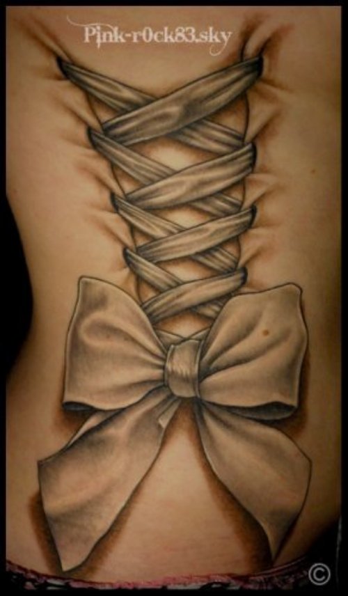 Grey Ink Corset Bow Tattoo On Back Body