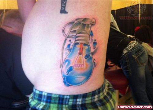 Grenade Bulb Tattoo On Rib